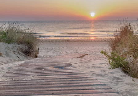 Strand behang Zonsondergang loopplank